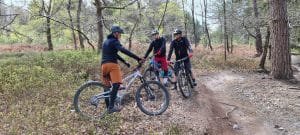 Mountain bikers receiving coaching