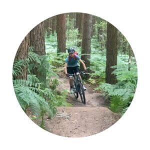 Testimonial slider image of young rider and marmalade mtb instructor