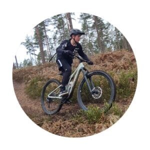 Testimonial slider image of young rider and marmalade mtb instructor