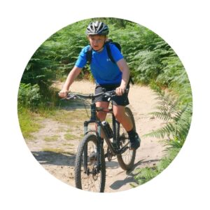 Testimonial slider image of young rider and marmalade mtb instructor